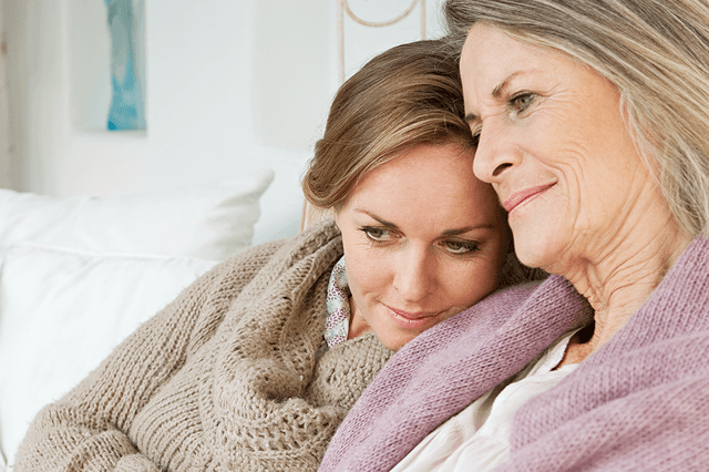 Mother and daughter embracing